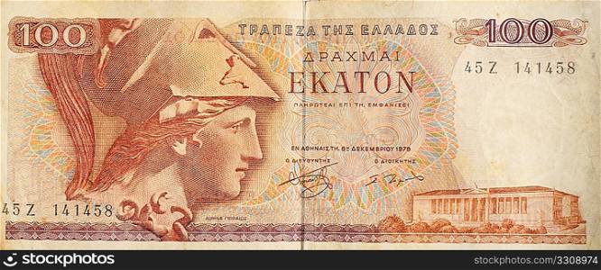 An old 100 Greek drachma note from just prior to the switch to the single european currency. Greece&acute;s weak economy is now causing problems for the euro zone.