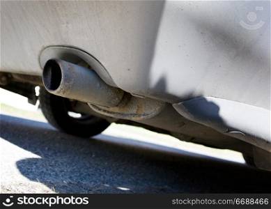 An old exhaust pipe on a car