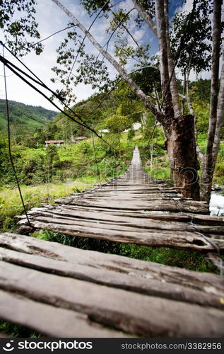 An old narrow hanging bridge