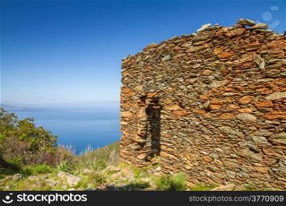 An old stone ruined building at the site of a 16th century iron ore mine near Farinole on Cap Corse in Corsica