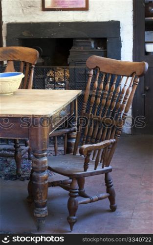 An Old Victorian Farmhouse Kitchen With Furniture