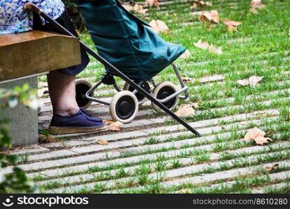 an old woman on a park bench