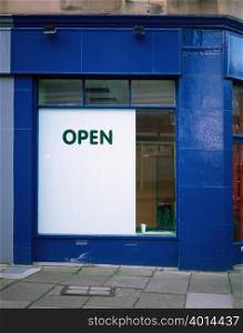 An open sign in a shop