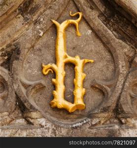 An ornate golden carving of the letter B is located in the town of Bruges in Belgium. Coincidentally, it is also over the doorway of the Basilius or the Basilica of the Holy Blood