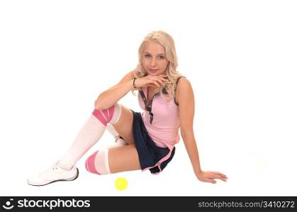 An portrait of a gorgeous teenager with curly blond hair and blue eyes,sitting on the floor in a tennis outfit, for white background.