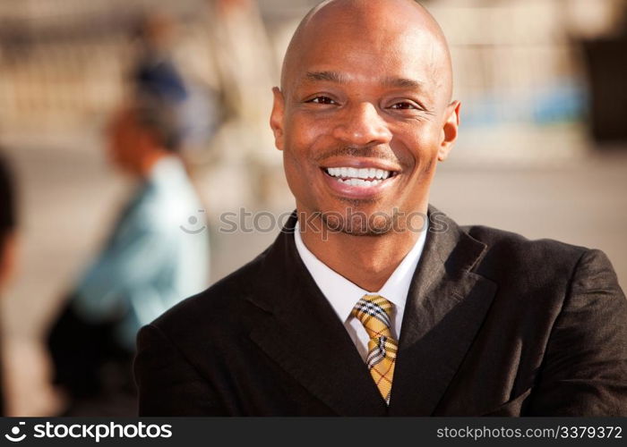 An portrait of an African American Business Man in an outdoor setting