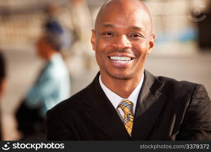 An portrait of an African American Business Man in an outdoor setting