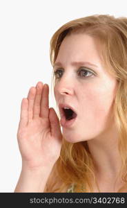 An serious teenage girl shouting a warning , with her mouth open andher hand at her face and with blond hair, over white background.