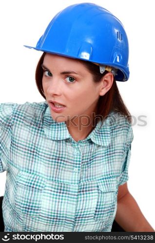 An unhappy female manual worker.