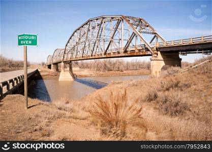 An unused railroad bridge sit rusting in the dry northern winter