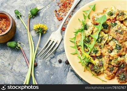 An unusual dish of fried dandelion flowers. Deep frying dandelion
