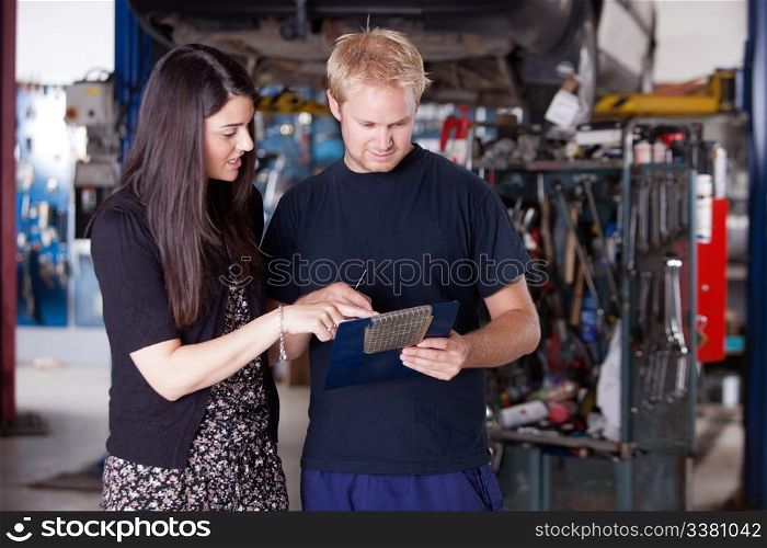An upset customer disputing a repair report with a mechanic
