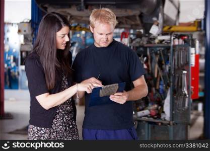 An upset customer disputing a repair report with a mechanic