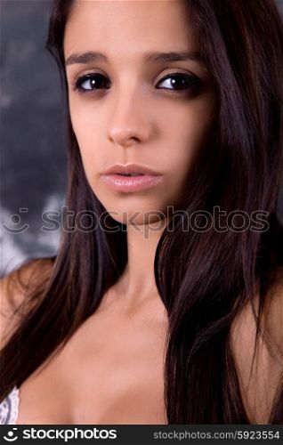 an young beautiful brunette close up portrait