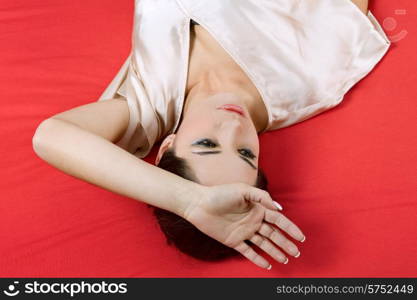 an young beautiful sensual woman in bed