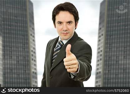 an young business man going thumb up