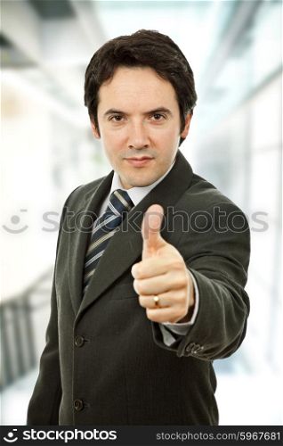 an young business man going thumb up