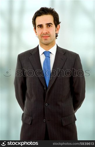 an young happy business man close up portrait