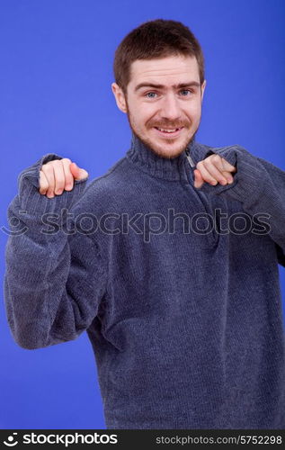 an young man portrait over a blue background