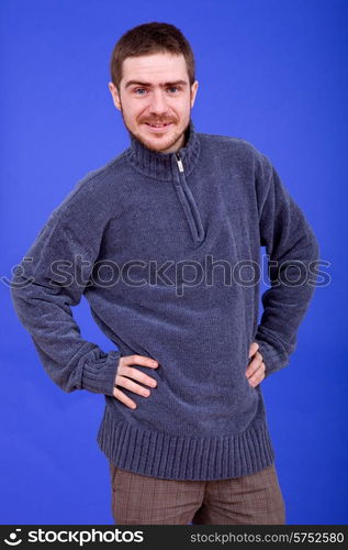 an young man portrait over a blue background