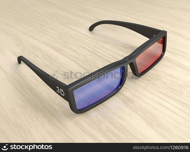 Anaglyph 3D glasses on wood table