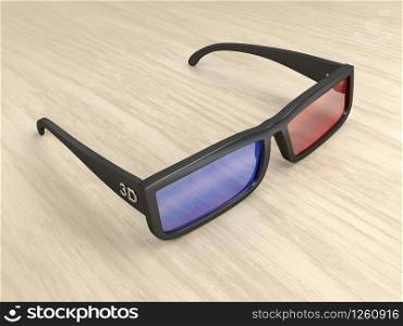 Anaglyph 3D glasses on wood table