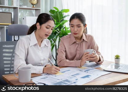 Analyst team colleagues discuss financial data on digital dashboard, analyzing charts and graph with supportive teamwork. Professional office use business intelligence to plan marketing. Enthusiastic. Analyst team colleague discuss financial data on digital dashboard. Enthusiastic