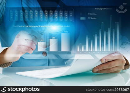 Analyzing statistics data. Close view of businesswoman working with papers at table