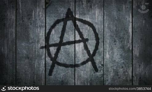 anarchy symbol on wooden background