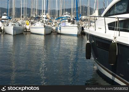 Anchored yachts in St. Tropez marina .