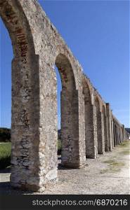 Ancient aqueduct in the medieval walled town of Obidos in the Oeste region of Portugal.