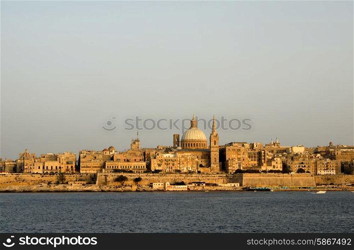 ancient architecture of malta island at sunset