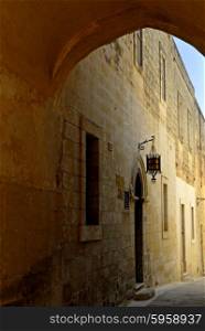 ancient archway in the town of Mdina, Malta.