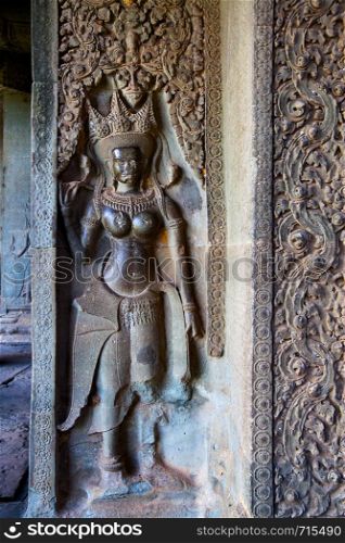 Ancient bas relief in The Angkor Wat Temple, Cambodia