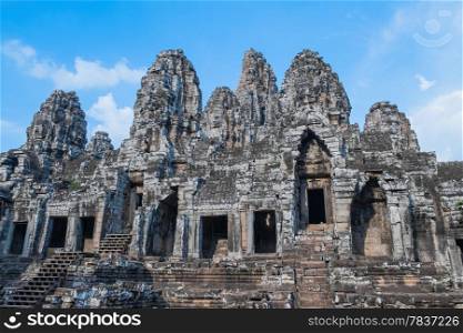 Ancient Bayon Temple with stone heads at Angkor Wat, Cambodia