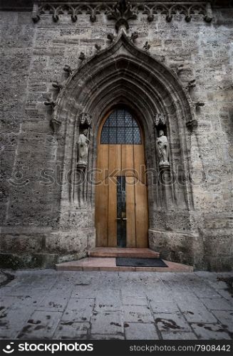 Ancient big doorway at Catholic cathedral