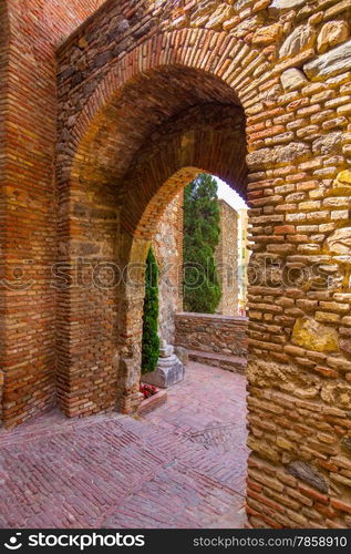 Ancient brick passageway door in the famous La Alcazaba in Malaga Spain