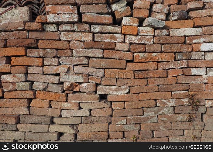 ancient brick wall background. ancient brick wall useful as a background