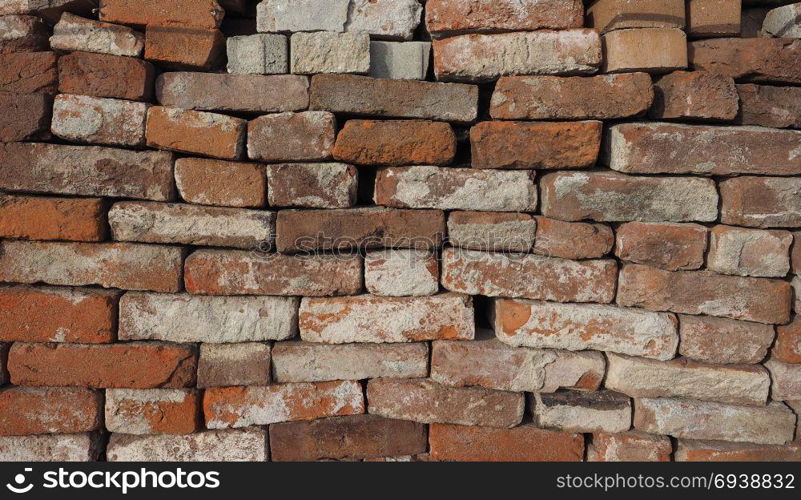 ancient brick wall background. ancient brick wall useful as a background