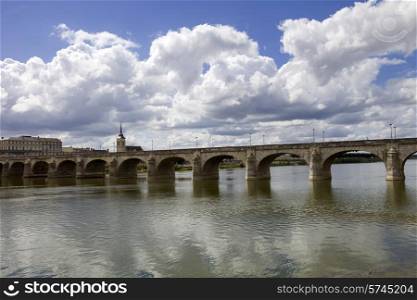 Ancient bridge of Saumur in Loire River, France