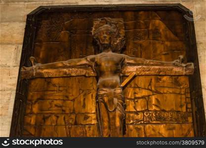 Ancient brown wooden crucifix inside Saint Vitus Cathedral in Prague: Jesus Christ?s death