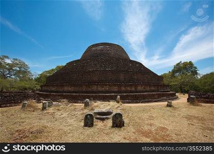 Ancient Buddhist dagoba (stupe) Pabula Vihara. Ancient city of Pollonaruwa, Sri Lanka