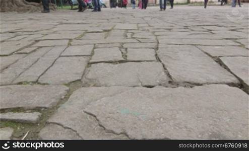 Ancient cobblestone pavement in old town dolly shot