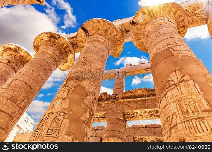 Ancient Columns with beautiful carvings, Karnak Temple, the Great Hypostyle Hall, Luxor, Egypt.. Ancient Columns with beautiful carvings, Karnak Temple, the Great Hypostyle Hall, Luxor, Egypt