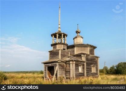 Ancient deserted wooden orthodox church in the village Verkhovie, Arkhangelsk region, Russia