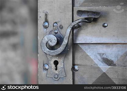 Ancient door handle on the gates