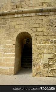 ancient door in an old building at malta island