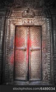 ancient doors of Nepal carved from stone and wood. ancient doors of Nepal