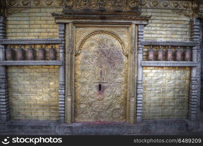 ancient doors of Nepal carved from stone and wood. ancient doors of Nepal