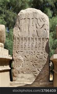 Ancient egypt stone with images and hieroglyphics, Karnak Temple, Luxor